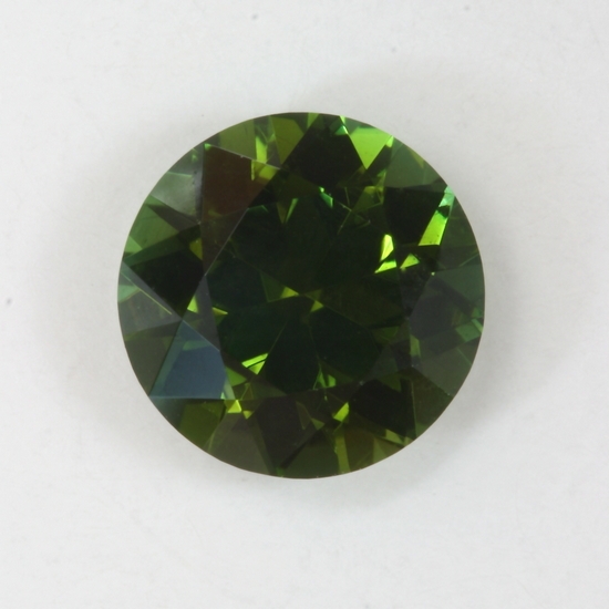 Average darker tone green round. #129