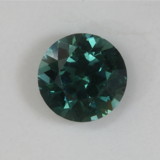 Nice medium dark tone, blue green droplet of color. #!26