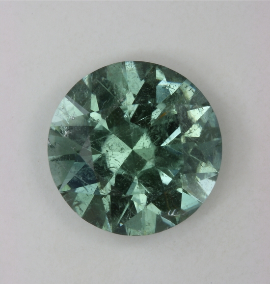Cuprian, Included medium pastel blue green round. #138