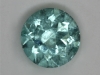 Moderately included, lightly tone pastel blue droplet of color. #111