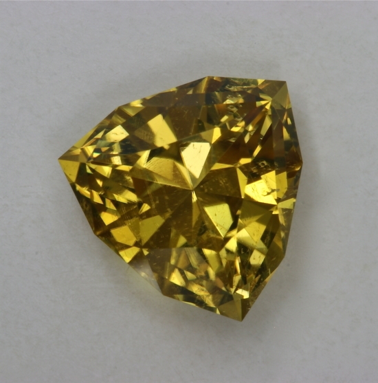 Beautiful yellow, slightly included shield cut, best yellow in the collection.  #169