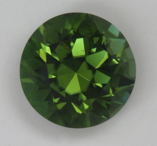 A fine green with no visible dichroism, droplet of color.  #171