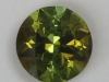 Incuded dichroic golden green/green round.  #153