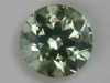 Pale yellow washed with green droplet of color.  #154