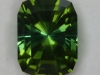 A fine Barion cushion cut that blends the  dichroic greens beautiful.  #164