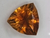 Golden orange trilliant has significant non flashing inclusions.  #179