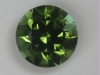In natural light, this has a touch of blue in the green round.  #181
