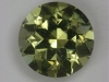 A mostly yellow with a wash of green, cuprian round.  #182
