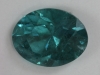 Included spicy blue on the green side, oval. #219