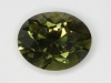 An eye clean brownish green oval. #233