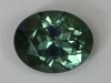 This pale bluer green oval is eye clean. #235