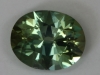 This oval is definitely a dichroic, medium light green. #241