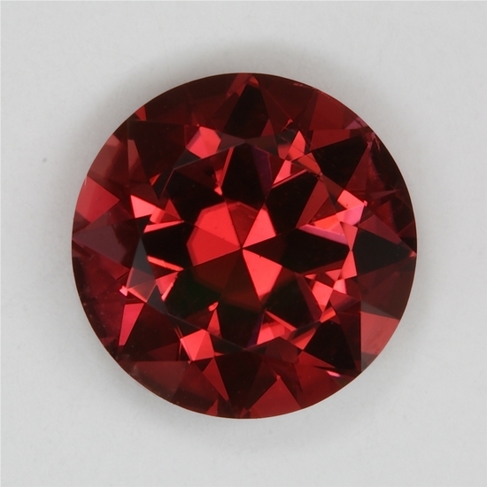 A red pink that shifts,purple to orange overtone, droplet of color.  #255