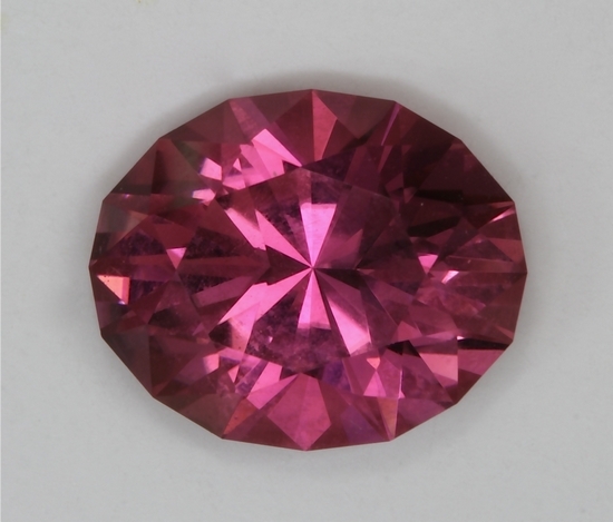 Highly transparent, bright, medium light pink, oval  #273