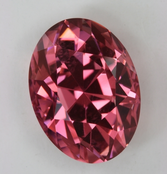 A very deep bright peach pink oval  #296