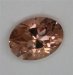Lightly toned peach oval.  #257