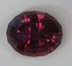 A larger oval that slides from oranger to pinker.  Liddicoatite  #282