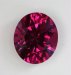 Rich sultry red pink that is eye clean and powerful, oval  #295