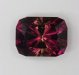 Clean emerald with a blackberry blush color. #310