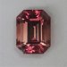 A dichroic and uniquely tourmaline pink emerald cut.  #327