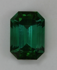 Smaller green with touch of blue emerald cut.  #362