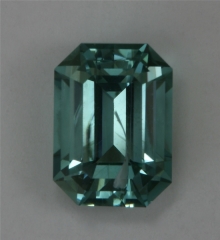 Cracked medium toned green with touches of blue emerald cut.  #366