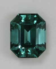 Beautiful, medium toned blue green emerald cut.  #376