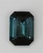 Included, closed ended, gray blue emerald cut with normal angles.  #354