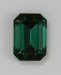 Beautiful, slightly dichroic, saturated green, emerald cut.  #372