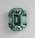 Lightly toned,  non dichroic. eye clean, blue green,  emerald cut.  #386
