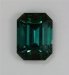 A medium dark toned blue green emerald that is included.  #394