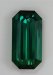 A fine classic dichroic blue green emerald cut with steep ends.  #400