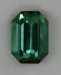Bright well saturated green emerald cut is slightly included.  #406