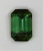 closed ended with normal angles, medium toned, green emerald cut.  #415