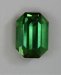 Fine, classical, closed ended, medium toned, yellowish green emerald cut.  #416