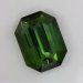 Large, closed ended, brownish yellow green emerald cut.  #436