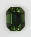 An emerald cut with its table perpendicular to the c axis, limited green flash  #445
