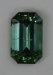 Flawed emerald cut with medium light toned blue green color  #449