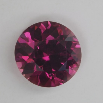 brilliant rich pink included tourmaline gem