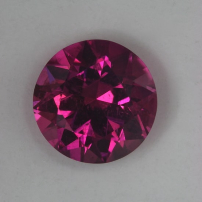 brilliant hot pink included tourmaline gem