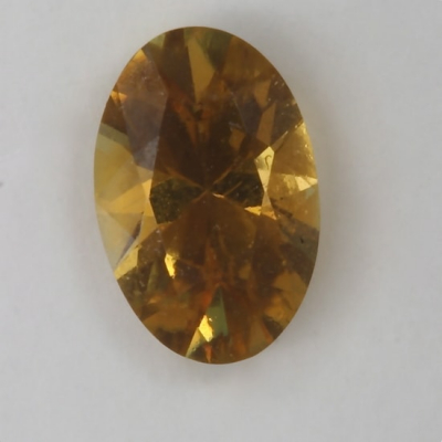 oval golden included tourmaline gem
