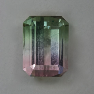 emerald tricolor included tourmaline gem