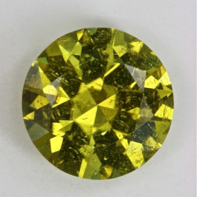 brilliant yellow green included tourmaline