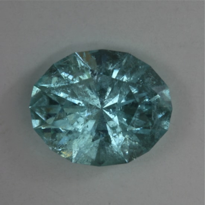 oval included blue light tourmaline gem