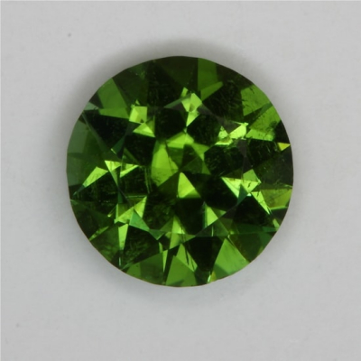 green round copper flaw tourmaline gem