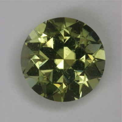 standard round brilliant yellow copper included tourmaline gem