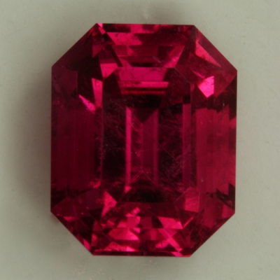 emerald cut pink included tourmaline gem