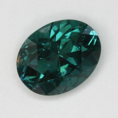 oval included blue medium tourmaline gem