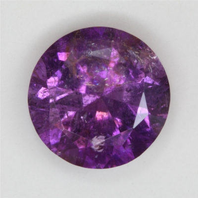 round purple copper flaw tourmaline gem