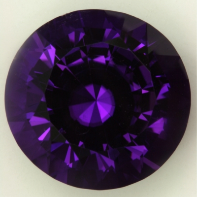 deep round blue purple copper included tourmaline gem